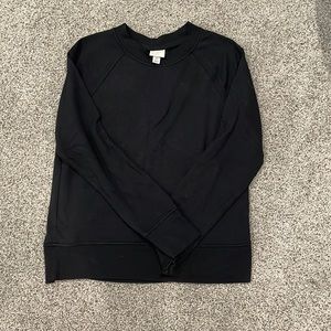 Black crewneck size xs has not stains by the brand A New Day